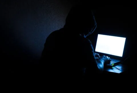 Computer Hacker Criminal at Work Stock Photos