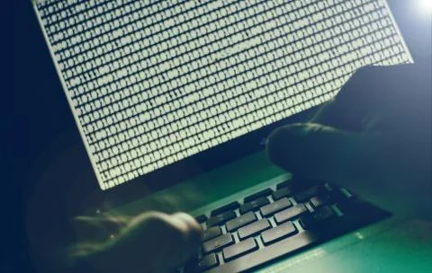 Computer hacker in dark Stock Photos