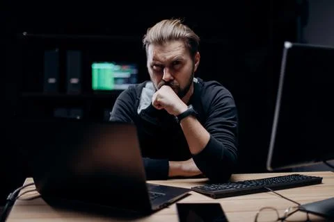 Computer hacker at dark room Stock Photos