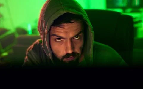 Computer hacker, face or neon man hacking online database software, website 写真素材