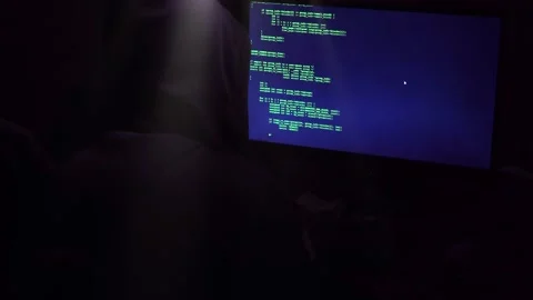 Computer Hacker In Hooded Shirt Coding Ransomware Attack To Steal Personal Data Stock Footage 171113667