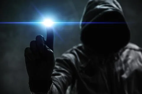 Computer hacker in hoodie using virtual screen. Database hacking, computer .. Stock Photos