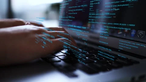 Computer hacker keyboard typing tampering program code Stock Footage 218419887