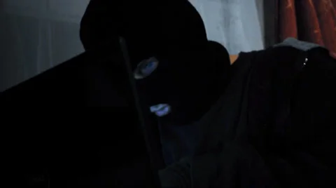 Computer Hacker at Laptop in the Dark Video stock 34538528