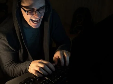 Computer hacker man stealing information with laptop Stock Photos