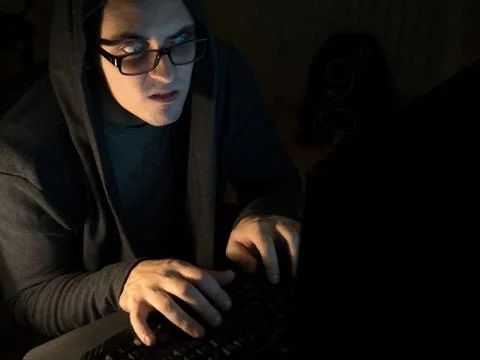 Computer hacker man stealing information with laptop Stock Photos