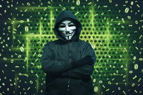 Computer hacker with mask standing Foto stock