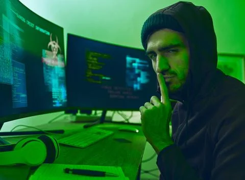 Computer hacker, neon and portrait of a man with secret for hacking, phishing or Stock Photos