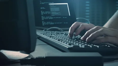 Computer Hacker in server room typing on... | Stock Video | Pond5