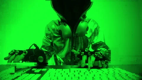 Computer hacker in silver jacket Stock Footage 144600299