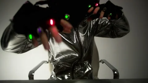 Computer hacker in silver jacket Stock Footage 144771806