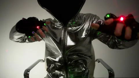 Computer hacker in silver jacket Stock Footage 144771885