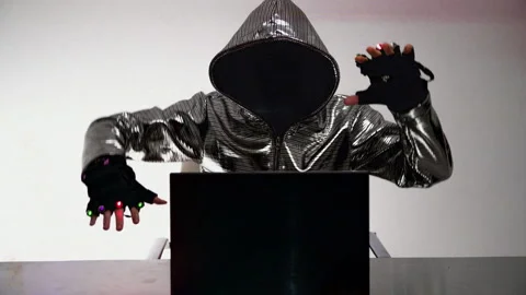 Computer hacker in silver jacket Stock Footage 144772333