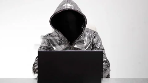 Computer hacker in silver jacket Stock Footage 144772489