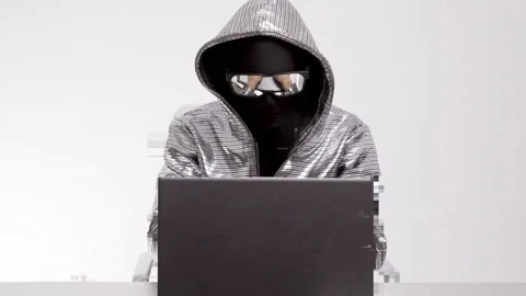 Computer hacker in silver jacket Stock Footage 144772802