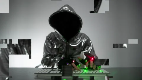Computer hacker in silver jacket Stock Footage 152367247