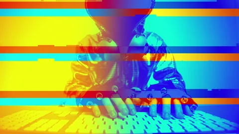 Computer hacker in silver jacket Stock Footage 227398830