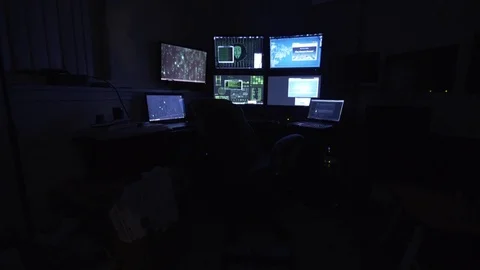 Computer Hacker Types, Then Gets Up From PC - Push In Shot Stock Footage 72879769