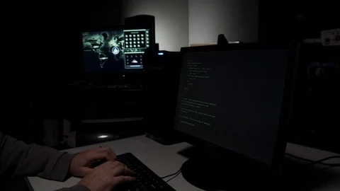 Computer hacker typing in code 스톡 동영상 107905127