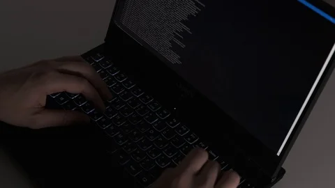 Computer hacker typing code on keyboard. Night working. Close up. Stock Footage 122216526
