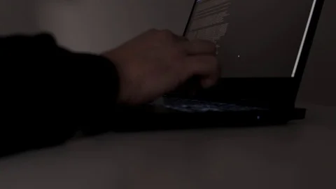 Computer hacker typing code on keyboard. Night working. Close up. Stock Footage 122216551