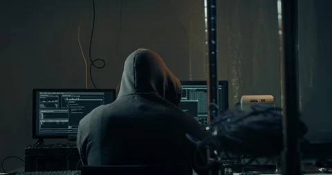 Computer Hacker on Typing Code on Network Computer Launching Cyber Attack Stock Footage 123088786