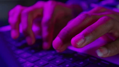 Computer Hacker Typing Code Virus PC on Keyboard Late Night Working. Stock Footage 234787671
