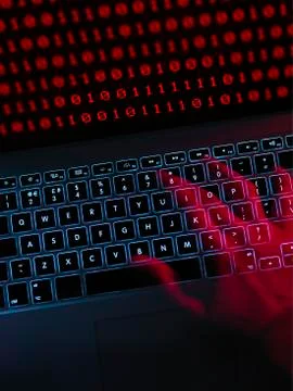 Computer hacker at work Stock Photos