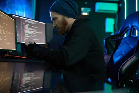 Computer hacker working at office Foto stock