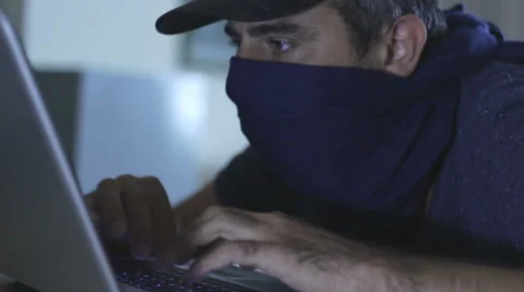 Computer hacking in the dark Stock Footage 40535030