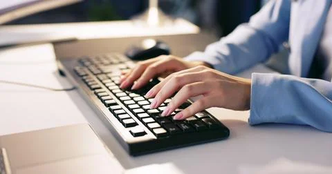 Computer, hands and keyboard typing of a business woman coding for programmer Foto stock