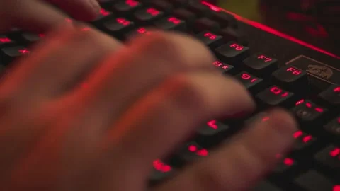 Computer hands typing on keyboard programmer coding hacking data on internet  Stock Footage 165152190