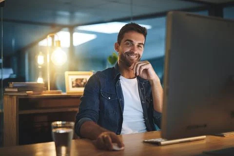 Computer, happy and man in office at night for software development and data Stock Photos