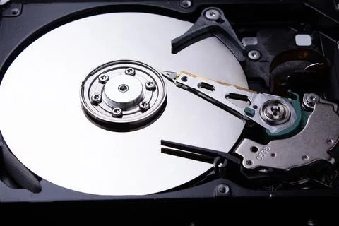 Computer hard disk closeup. Detail of a computer. Stock Photos
