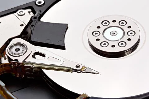 Computer hard disk drive close-up shot. Stacked photo. Stock Photos