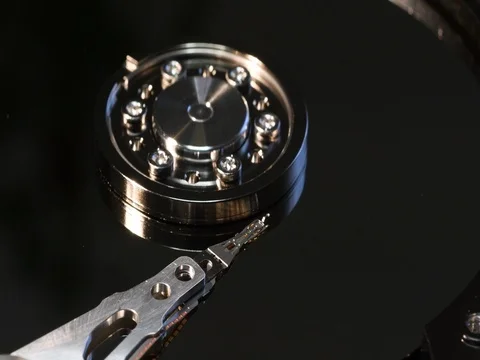 Computer hard disk drive spin up and head movement. Stock Footage 80535729