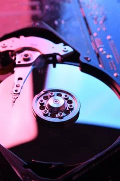 Computer Hard disk drives HDD , SSD on circuit board ,motherboard background. Stock Photos