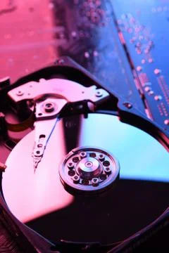 Computer Hard disk drives HDD , SSD on circuit board ,motherboard background. Fotos Stock