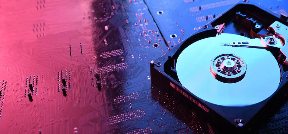 Computer Hard disk drives HDD , SSD on circuit board ,motherboard background. 스톡 사진