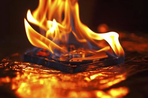 Computer hard disk on fire Stock Photos
