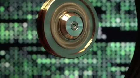 Computer hard disk on green moving background. Clouse-up. Stock Footage 302112866