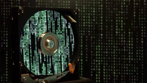Computer hard disk on green moving background. Stock Footage 310648560