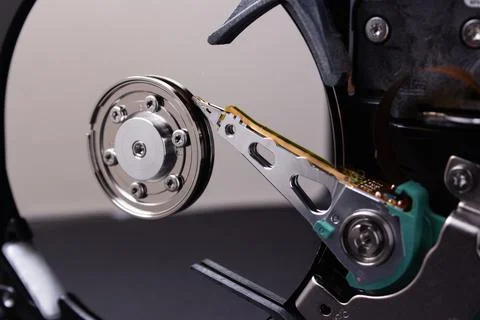 Computer hard disk from inside close up. Detail of a computer. Stock Photos