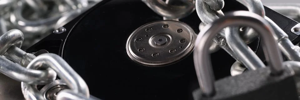 Computer hard drive with chain lock closeup Foto stock
