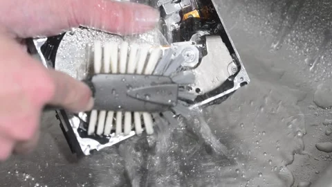 Computer hard drive under running water. Stock Footage 220725839