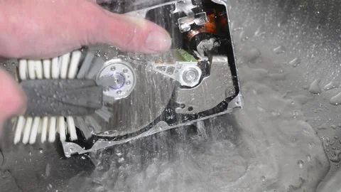 Computer hard drive under running water. Stock Footage 220725973