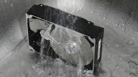 Computer hard drive under running water. Stock Footage 220726556