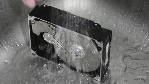 Computer hard drive under running water. Stock Footage 220726778