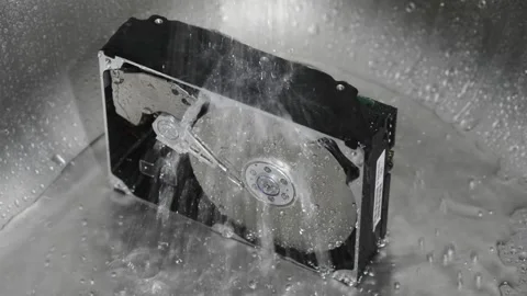 Computer hard drive under running water. Stock Footage 220726807