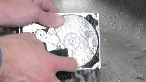 Computer hard drive under running water. Stock Footage 220727062
